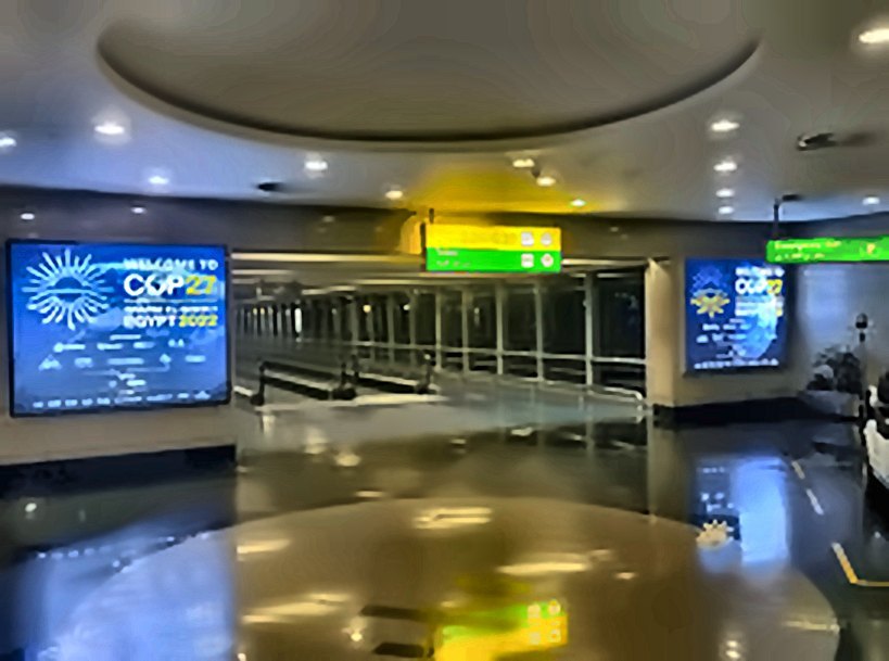 COP27 airport lightboxes